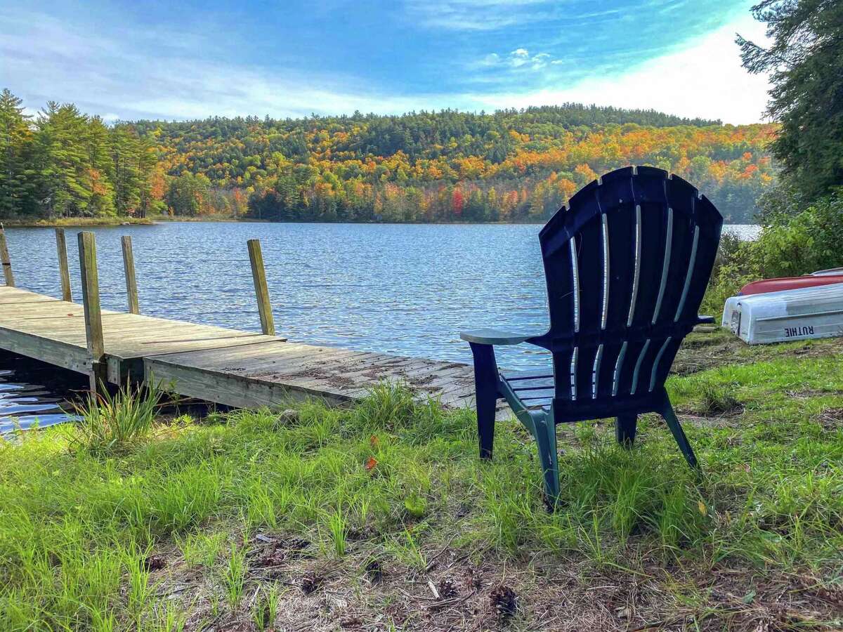 55 Red Fox La. Hague, NY PRICE: $2,200,000 DESCRIPTION: Four season waterfront home w/ 100' of shoreline in Arcady Bay on Northwestern Lake George. Captivating lake views, 2677sqft of living space, cathedral ceilings, 2-story 2-sided fireplace in the great room, 5BRs & 3 full BAs, lakeside screened porch & deck on main floor, lower level w/ family room, wood stove & bluestone patio. Lakeside patio steps down to a U-shaped articulating dock w/ sandy swimming. Arcady Bay's association amenities include a common beach & pavilion, tennis, backboards, basketball court, volleyball courts, shuffleboard, soccer & baseball fields & playground. Just minutes south of the charming hamlet of Hague, w/ easy access to Ti Country Club for golf/dining and Gore Mt for skiing. Walk/jog the Friendship Trail to the Silver Bay YMCA campus. 20 min north of Bolton. SIZE: 1831 square feet BEDROOMS: 5 MLS ID: 202116829 AGENT: Elaine Lawrence BROKERAGE: Sherwood Group, LLC Photos and listing copyright 2021 by Sherwood Group, LLC and associated MLS.