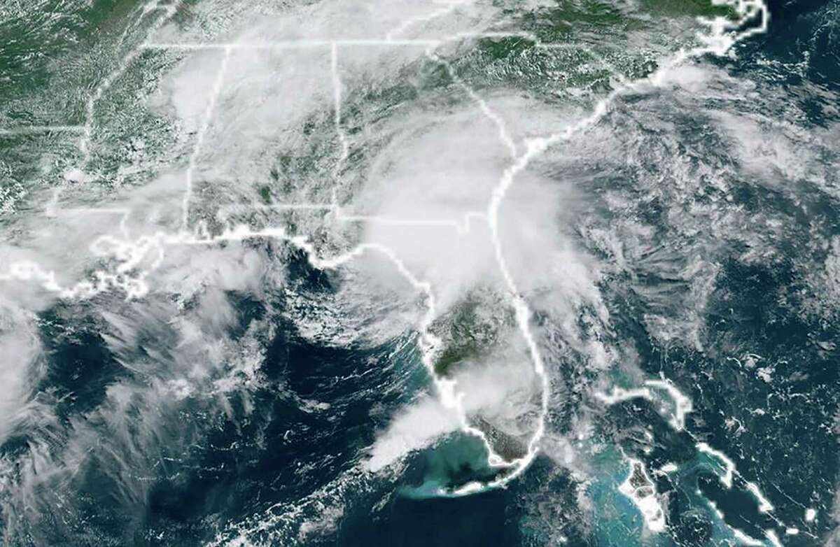 This National Oceanic and Atmospheric Administration (NOAA) satellite image taken at 16:10 UTC on July 7, 2021 shows Tropical Storm Elsa over the US state of Florida. - Tropical Storm Elsa made landfall in Florida on July 7, 2021, lashing the Gulf Coast of the southern US state with strong winds and heavy rain, the National Hurricane Center said. The NHC said the center of the storm, which was downgraded from a Category 1 hurricane overnight, was making landfall in Taylor County along the Gulf Coast of northern Florida. (Photo by Handout / NASA/NOAA / AFP) / RESTRICTED TO EDITORIAL USE - MANDATORY CREDIT "AFP PHOTO / NOAA/CIRA/RAMMB / HANDOUT " - NO MARKETING - NO ADVERTISING CAMPAIGNS - DISTRIBUTED AS A SERVICE TO CLIENTS (Photo by HANDOUT/NASA/NOAA/AFP via Getty Images)