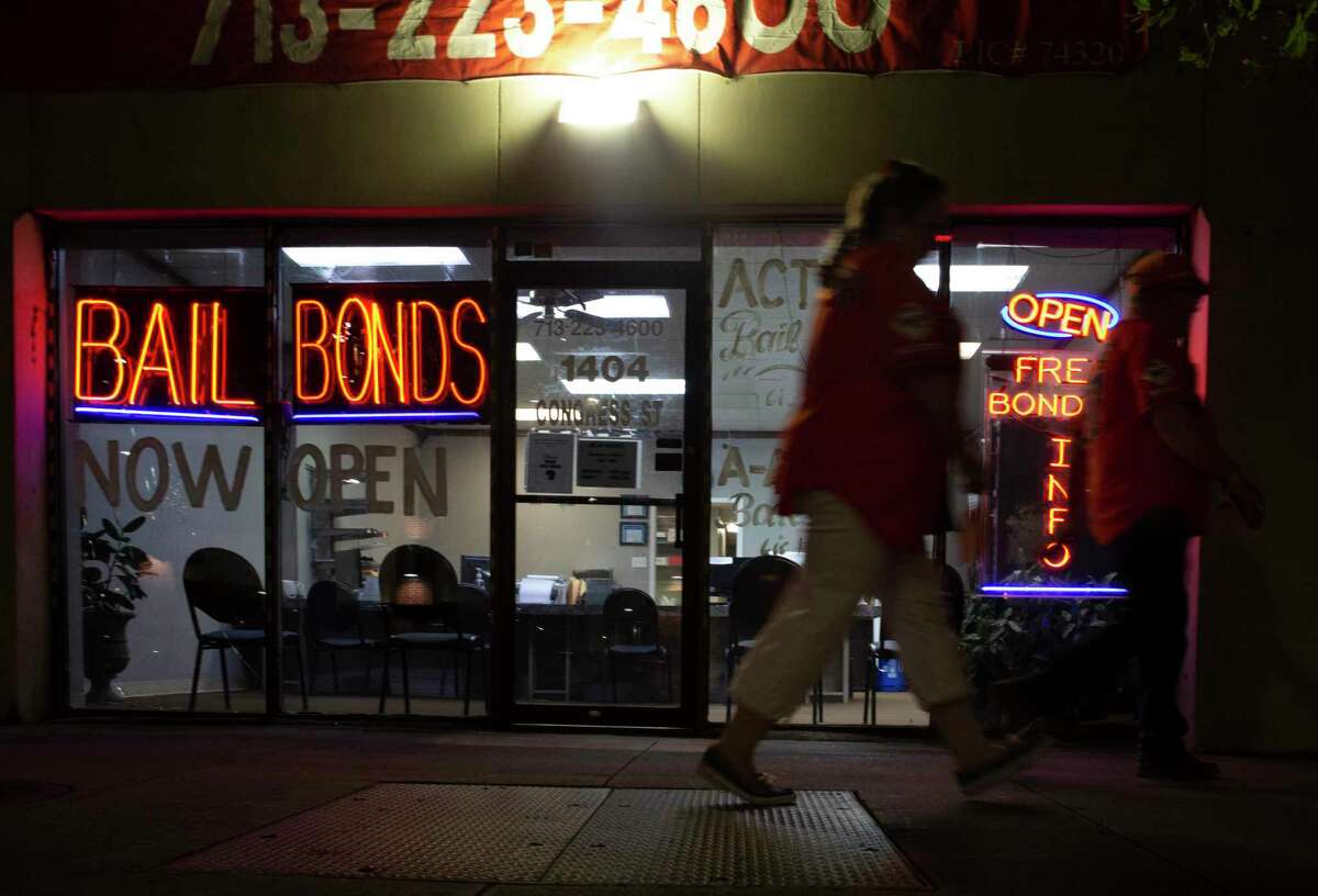 Action Bail Bonds is photographed at night Wednesday, June 30, 2021, in downtown Houston.