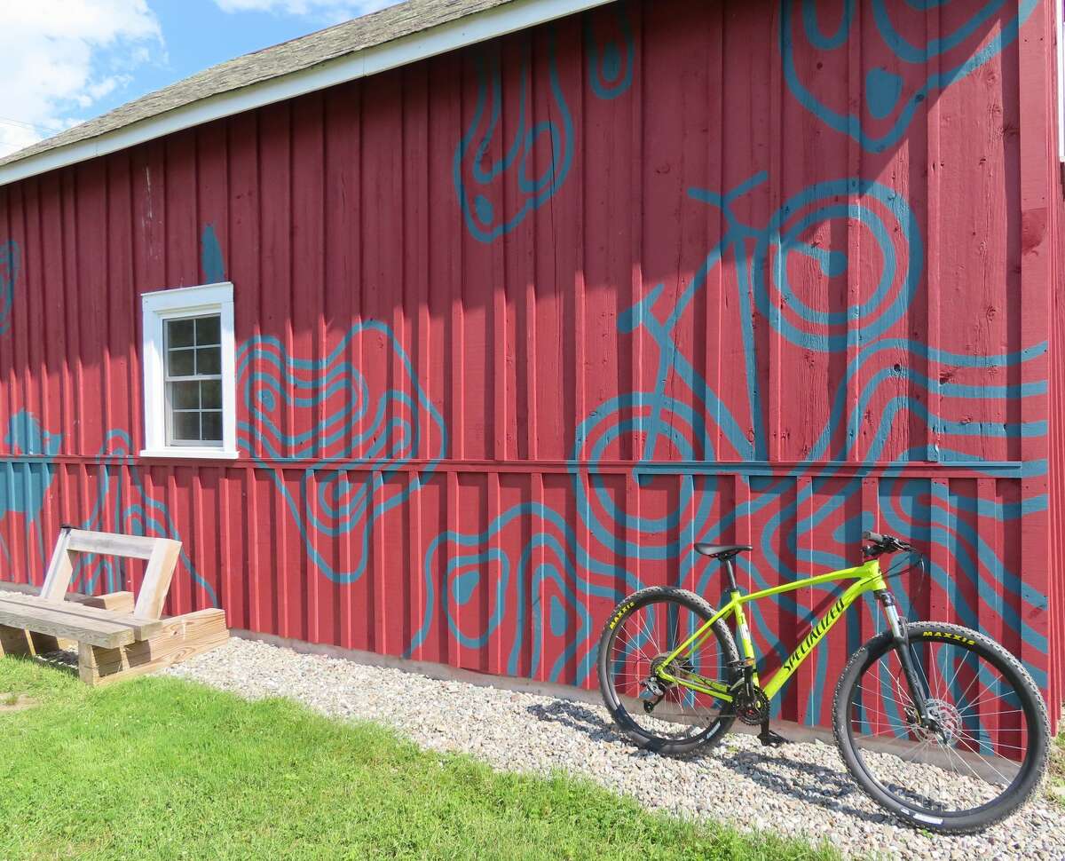 The bike-inspired mural at the Fairgrounds Trail of the Slate Valley Trails.