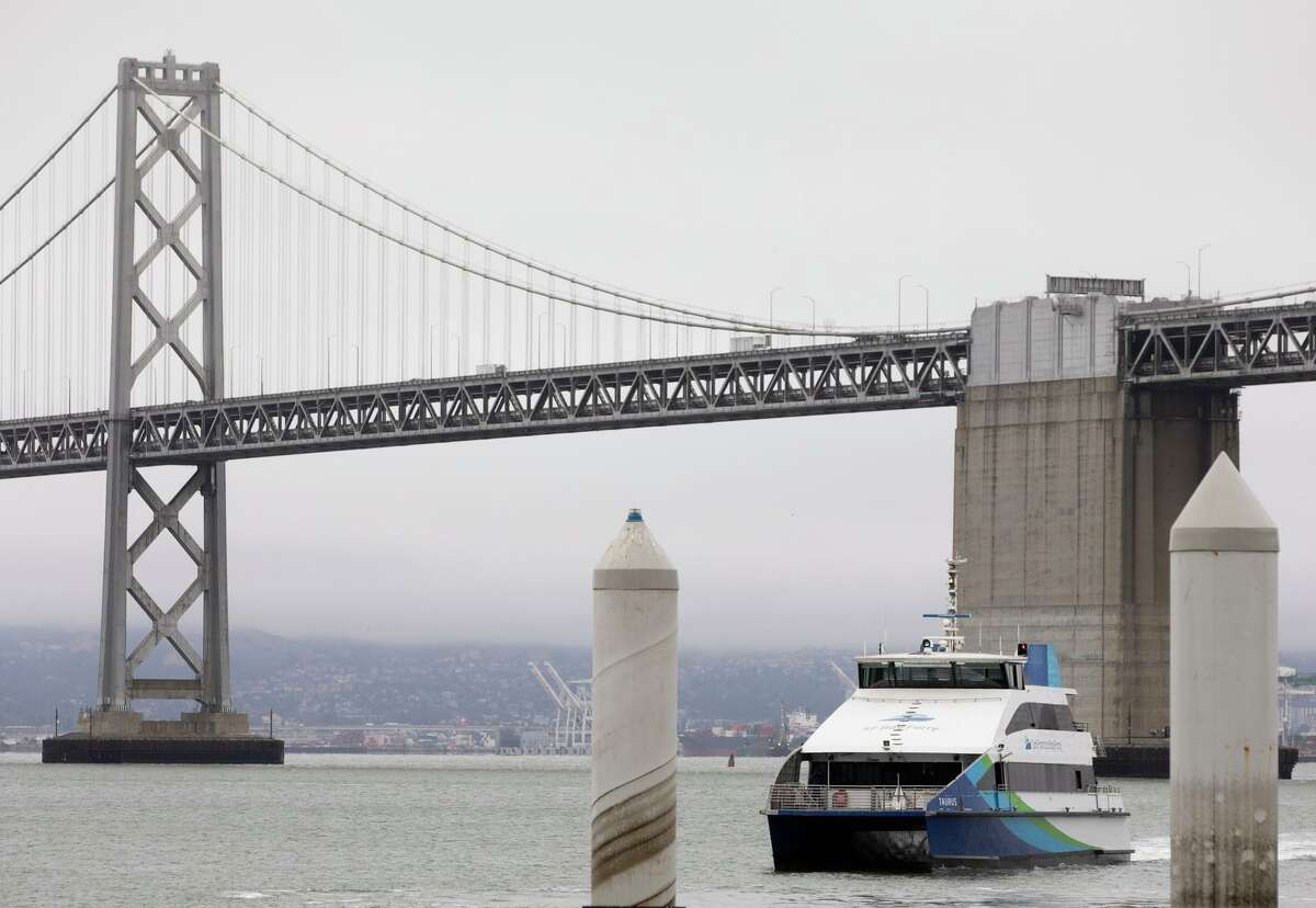 A San Francisco Bay Ferry arrives from Richmond at the ferry terminal in San Francisco, Calif. Tuesday, July 6, 2021. Ferry ridership has slowly increased in recent weeks with more commuters returning to the office and tourists taking public transit.