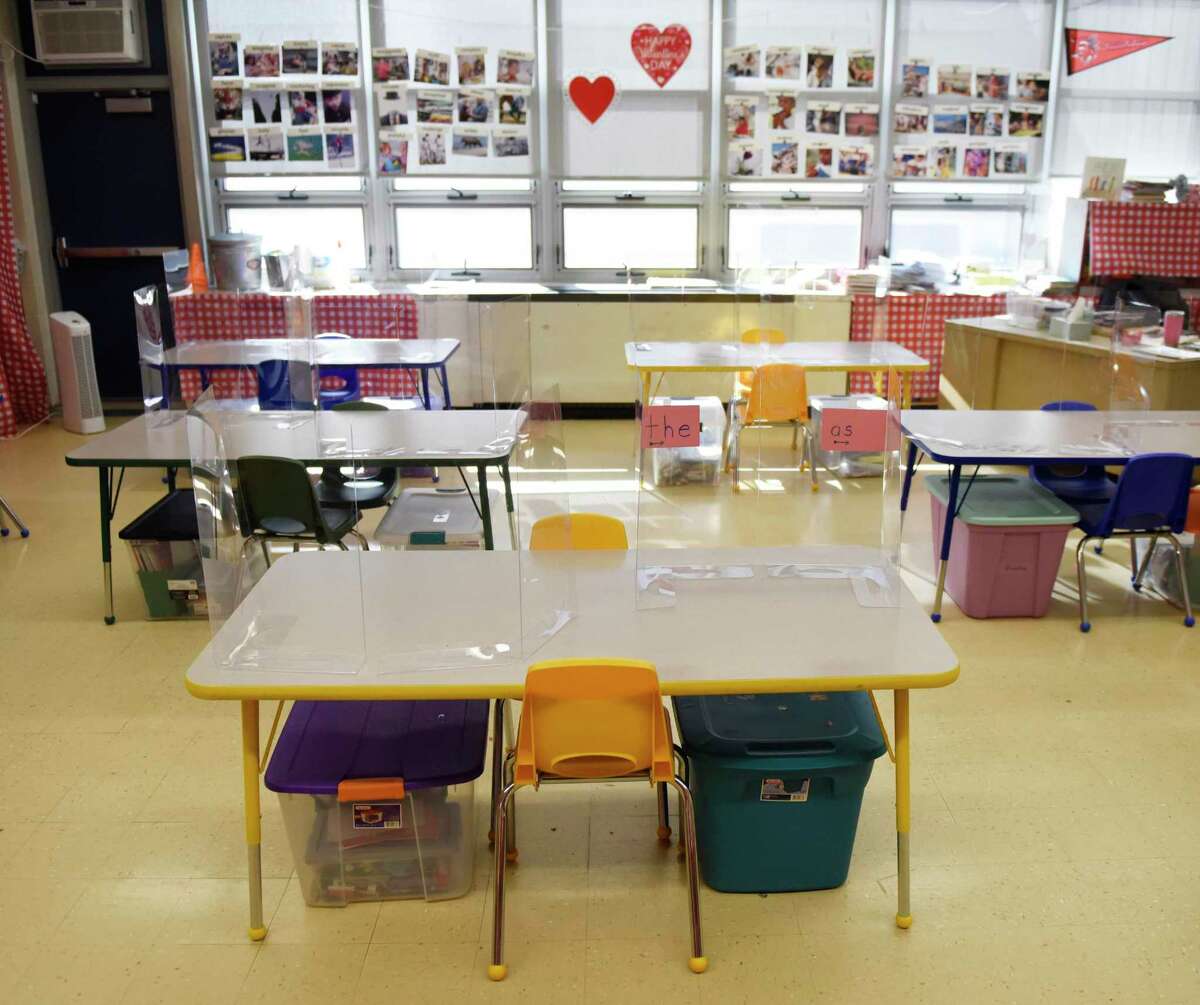 Classrooms are set up with COVID-19 precautions in place as students prepare to return five days-a-week at Northeast Elementary School in Stamford, Conn. Monday, March 8, 2021. For the first time in about a year, elementary students will return to full-time in-person learning starting Tuesday.