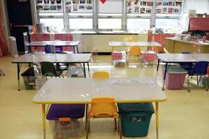Classrooms are set up with COVID-19 precautions in place at Northeast Elementary School in Stamford, Conn. Monday, March 8, 2021.