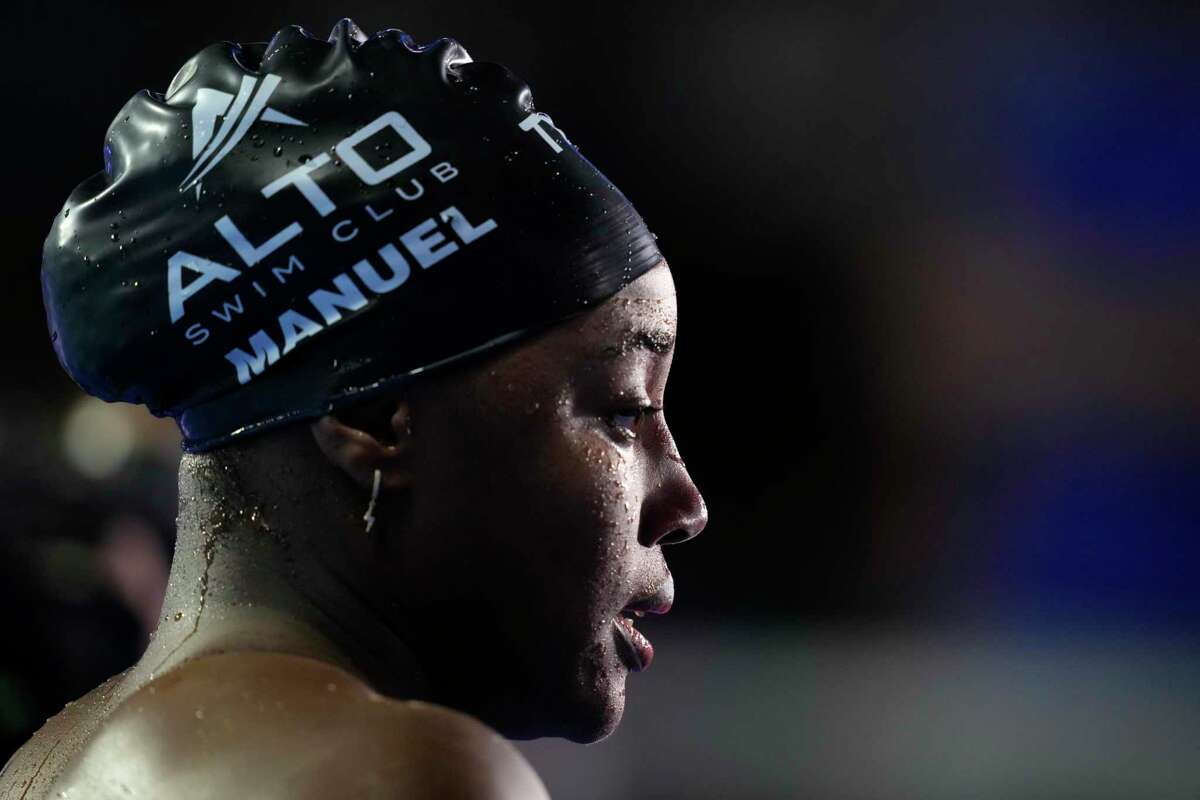 Simone Manuel is interviewed after winning the women's 50-meter freestyle final during wave 2 of the U.S. Olympic Swim Trials on Sunday, June 20, 2021, in Omaha, Neb. (AP Photo/Charlie Neibergall)