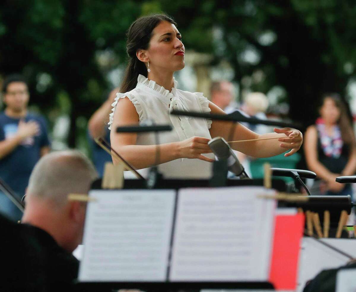 New Music Director Anna-Maria Gkouni leads the Conroe Symphony during a concert at Heritage Place Park, Saturday, July 3, 2021, in Conroe.