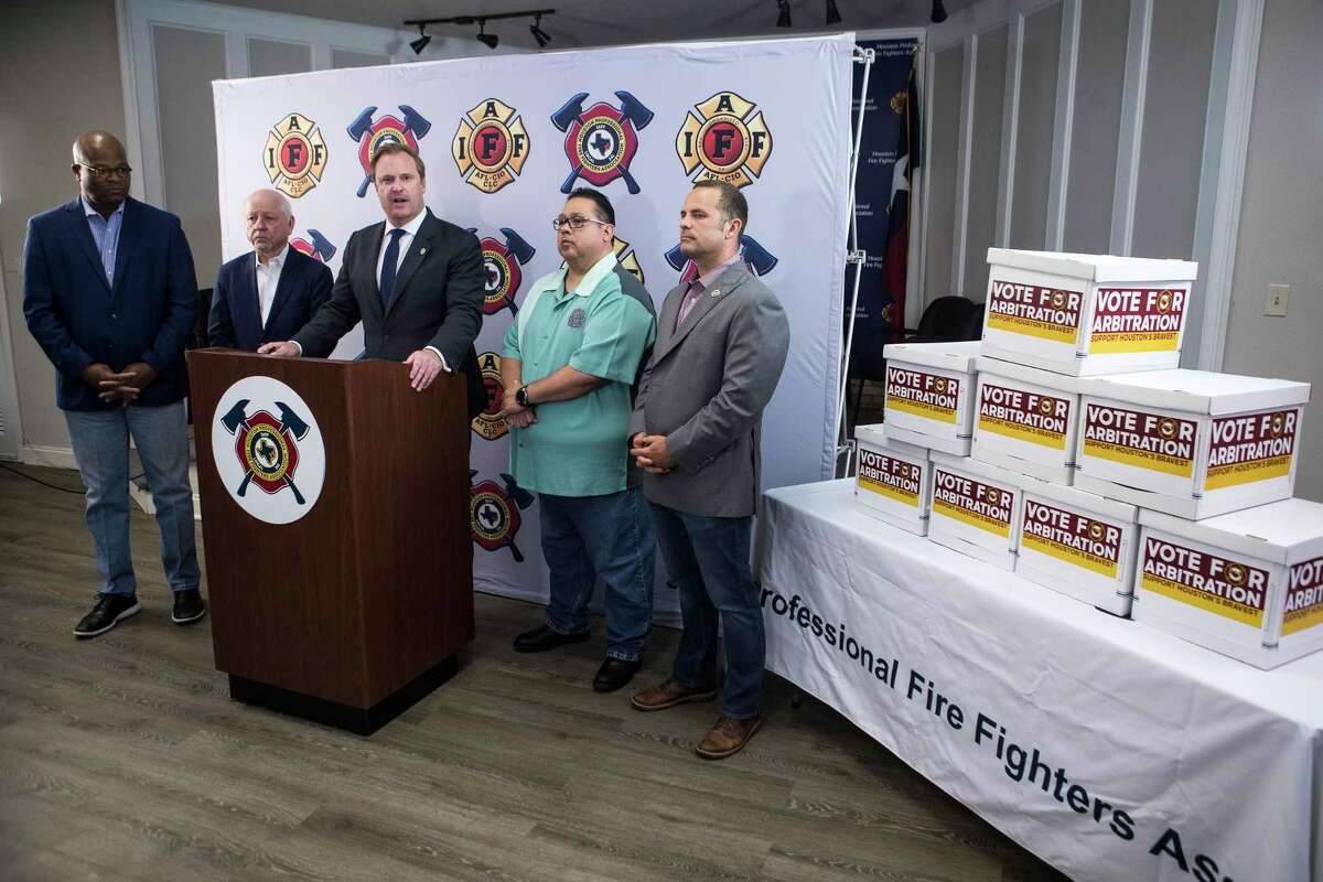 Marty Lancton, president of the Houston Professional Firefighters Association, announces that the firefighters have collected enough signatures, in a petition drive, needed to force a November vote on a city charter referendum to allow binding arbitration for contract disputes, during a news conference Friday, July 9, 2021 in Houston.