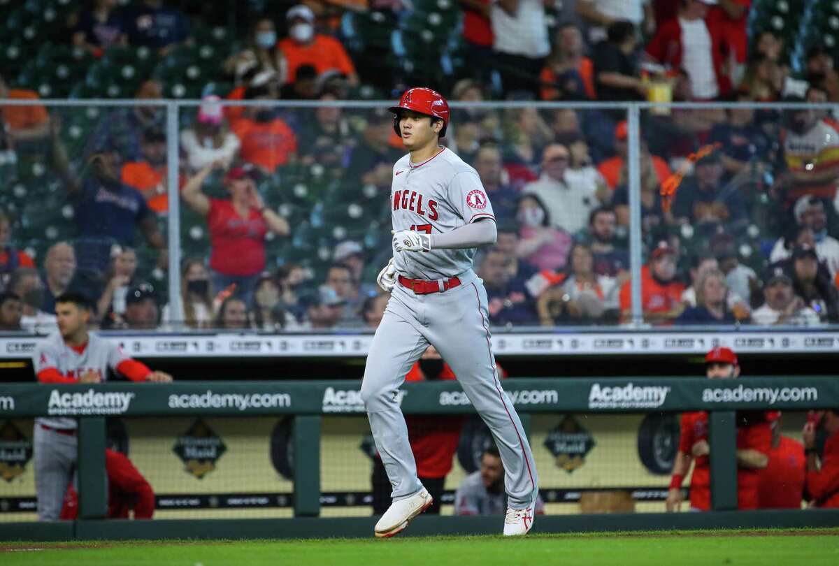 Los Angeles Angels designated hitter Shohei Ohtani (17) hits a solo home run against the Houston Astros during the third inning of an MLB game at Minute Maid Park on Saturday, April 24, 2021, in Houston.