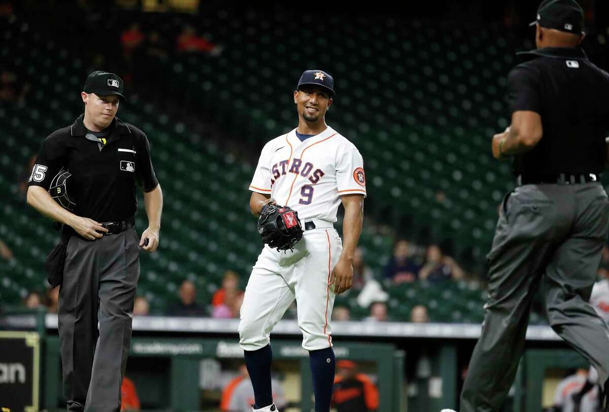 Umpire Kerwin Danley inspects Andre Scrubb of the Houston Astros for  News Photo - Getty Images