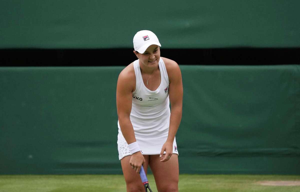 Australia's Ashleigh Barty smiles during the women's singles final match against Czech Republic's Karolina Pliskova on day twelve of the Wimbledon Tennis Championships in London, Saturday, July 10, 2021.