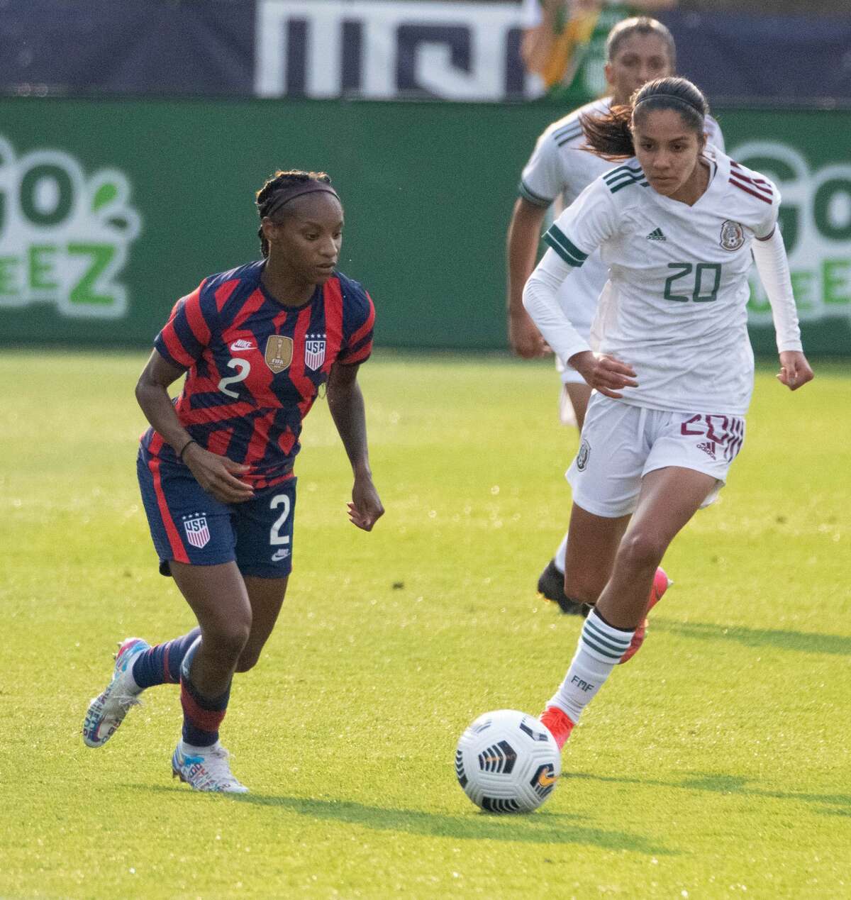 Crystal Dunn of the US Women's Soccer National Team and Mexico's Alison Gonzalez during a Send-Off Series match against Mexico at Pratt & Whitney Stadium in East Hartford, Conn. on Monday, July 5, 2021. The U.S. won 4-0 over Mexico. (Joyce Bassett / Special to the Times Union)