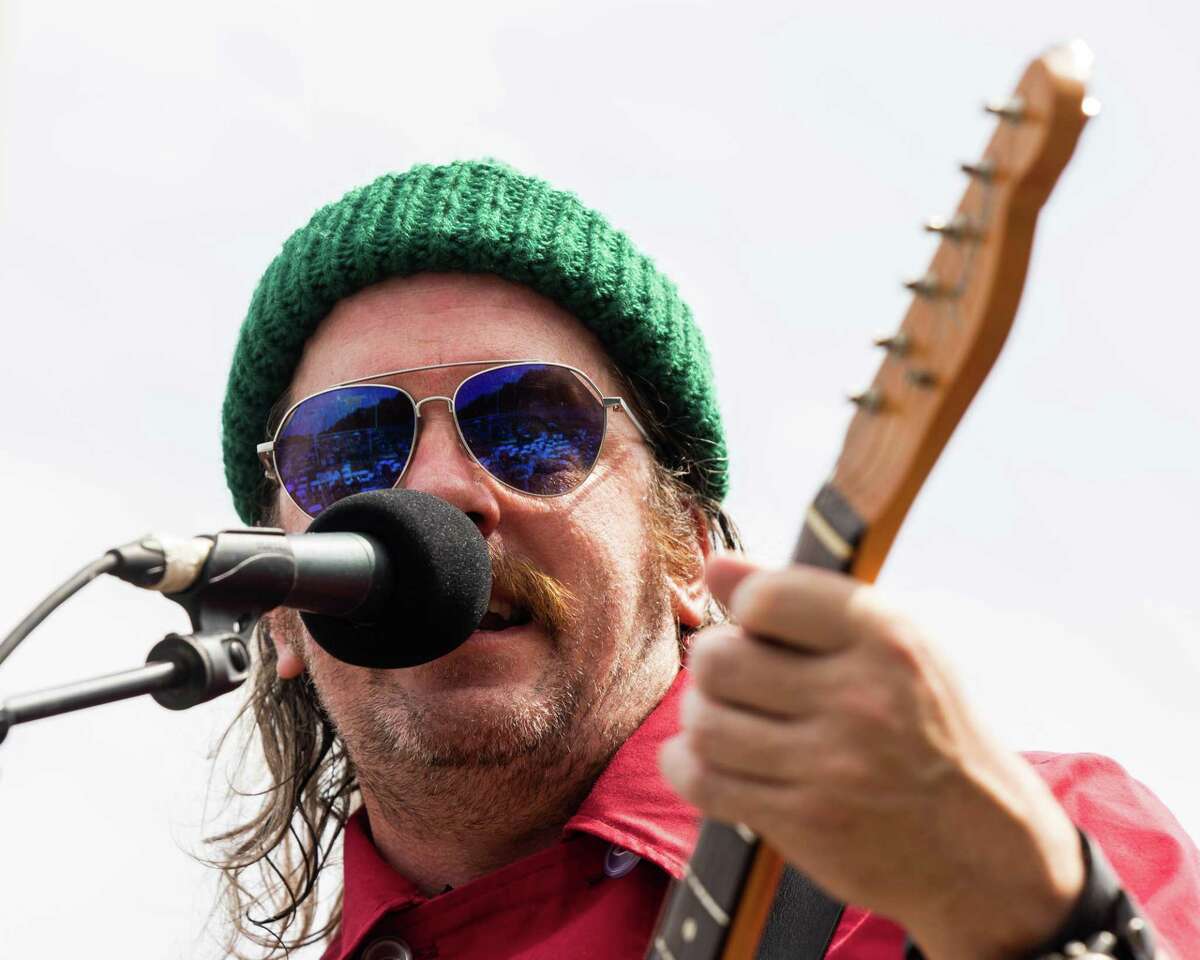 David Tessier, frontman for the Monkees tribute band Zilch sings during the Fab Four Music Festival at Nolan Field in Ansonia on Saturday, July 10 2021.