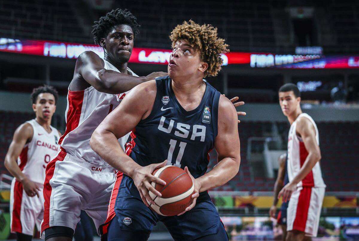 Kenneth Lofton Jr. powers his way to the rim during Saturday's semifinal win over Canada in the Under-19 FIBA World Cup.