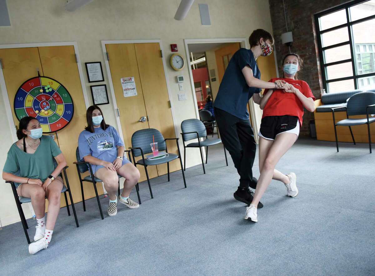Ben Walker and Joelle Singer Jensen, both 17, rehearse choreography from "The Last Five Years" at River House in the Cos Cob section of Greenwich, Conn. Sunday, July 11, 2021. Unlike many of the arts organizations in town, Greenwich Arts Alliance never closed during the COVID-19 pandemic. The nonprofit, which uses therapeutic arts programs to educate students and seniors, began rehearsal in person again during the first week in June and plans to host two upcoming shows in mid-and-late July.