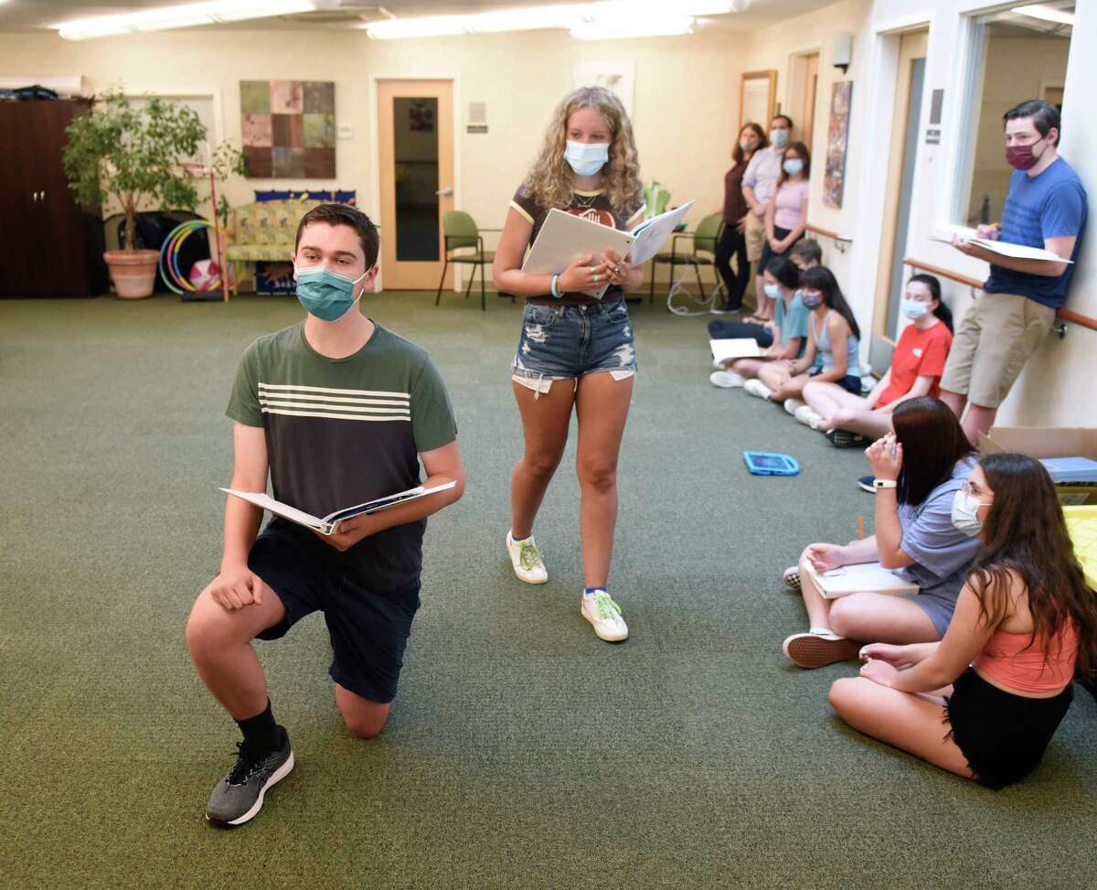 Josh Winston and Jordyn Libow, both 17, playing the roles of Jamie and Cathy in "The Last Five Years," rehearse at River House in the Cos Cob section of Greenwich, Conn. Sunday, July 11, 2021. Unlike many of the arts organizations in town, Greenwich Arts Alliance never closed during the COVID-19 pandemic. The nonprofit, which uses therapeutic arts programs to educate students and seniors, began rehearsal in person again during the first week in June and plans to host two upcoming shows in mid-and-late July.
