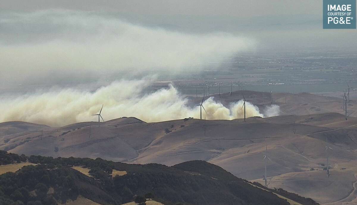 A brush fire started July 11, 2021 near Byron, Calif.