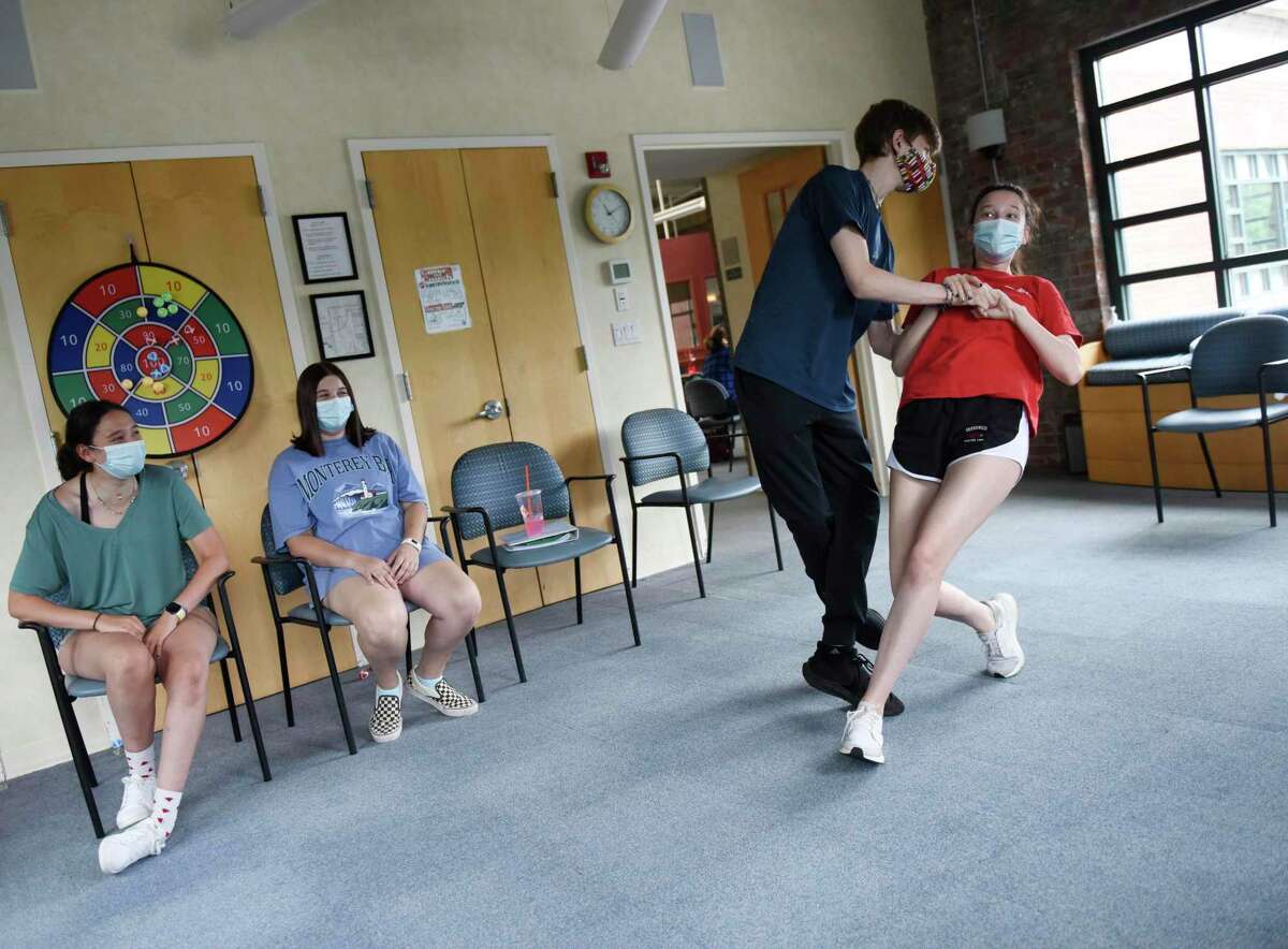 Ben Walker and Joelle Singer Jensen, both 17, rehearse choreography from "The Last Five Years" at River House in the Cos Cob section of Greenwich, Conn. Sunday, July 11, 2021. Unlike many of the arts organizations in town, Greenwich Arts Alliance never closed during the COVID-19 pandemic. The nonprofit, which uses therapeutic arts programs to educate students and seniors, began rehearsal in person again during the first week in June and plans to host two upcoming shows in mid-and-late July.