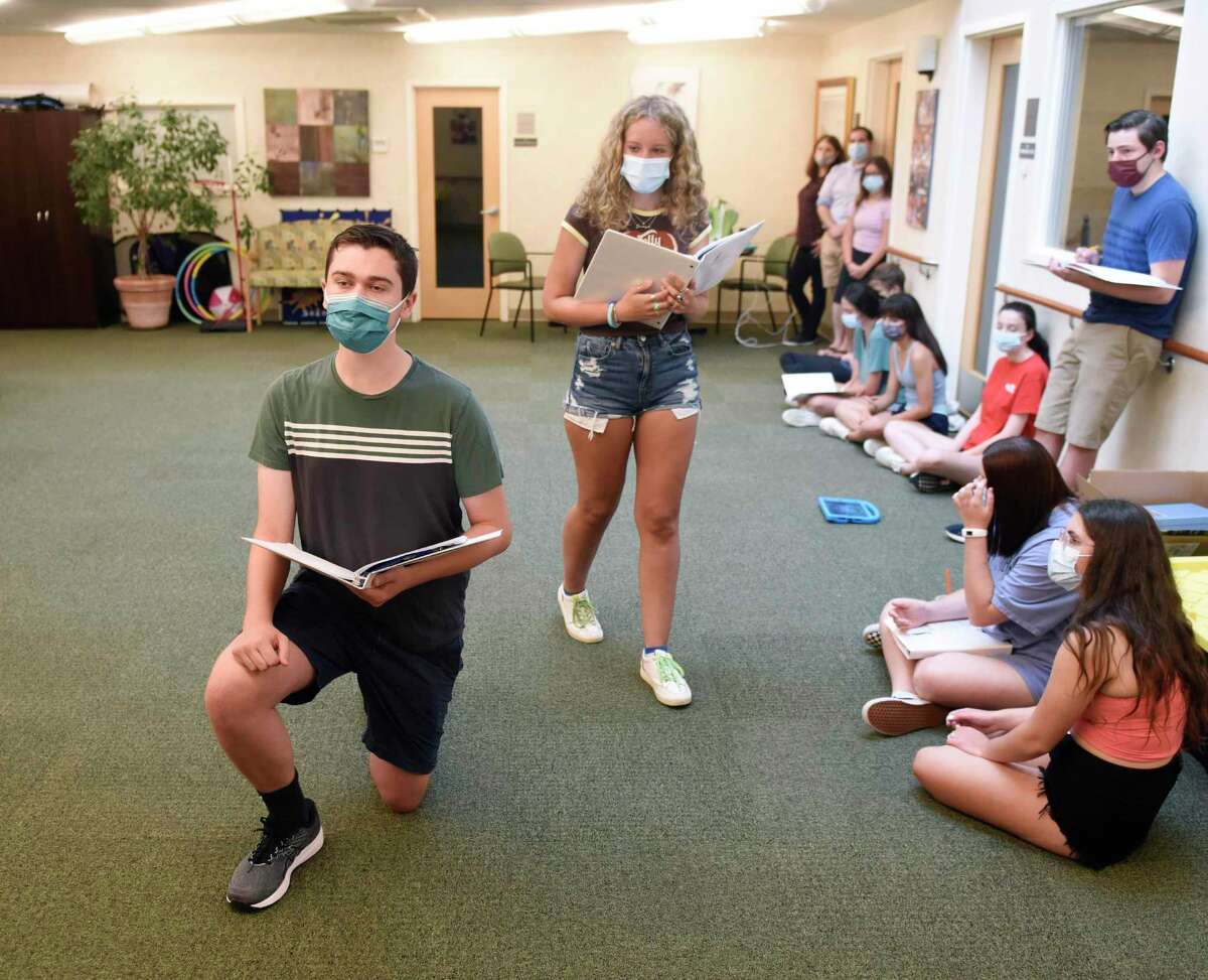 Josh Winston and Jordyn Libow, both 17, playing the roles of Jamie and Cathy in "The Last Five Years," rehearse at River House in the Cos Cob section of Greenwich, Conn. Sunday, July 11, 2021. Unlike many of the arts organizations in town, Greenwich Arts Alliance never closed during the COVID-19 pandemic. The nonprofit, which uses therapeutic arts programs to educate students and seniors, began rehearsal in person again during the first week in June and plans to host two upcoming shows in mid-and-late July.