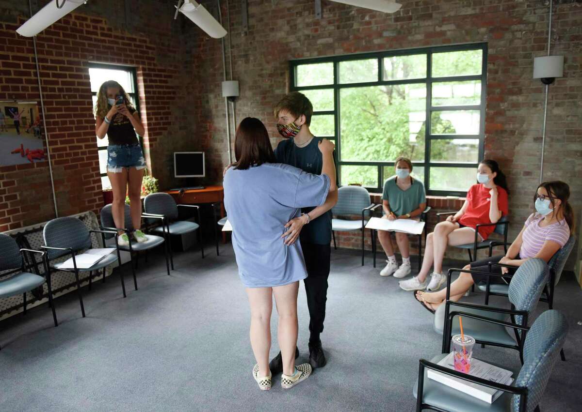 Ava Wagner-Nast, 14, and Ben Walker, 17, rehearse choreography from "The Last Five Years" at River House in the Cos Cob section of Greenwich, Conn. Sunday, July 11, 2021. Unlike many of the arts organizations in town, Greenwich Arts Alliance never closed during the COVID-19 pandemic. The nonprofit, which uses therapeutic arts programs to educate students and seniors, began rehearsal in person again during the first week in June and plans to host two upcoming shows in mid-and-late July.