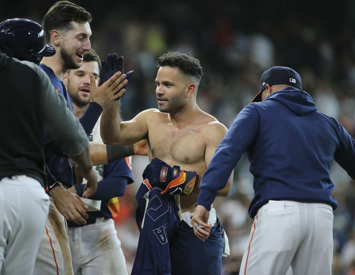 Houston Chronicle - Houston Astros players ripped Jose Altuve's jersey  after Altuve hit a walk-off three-run home run. The Astros defeated the New  York Yankees 8-7 Sunday, July 11, 2021, at Minute