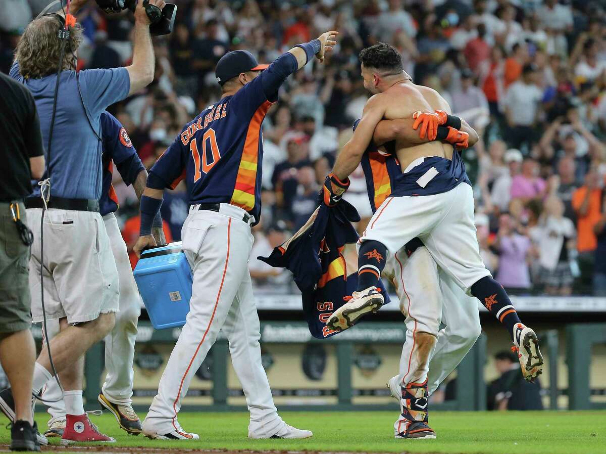 PHOTOS: Relive Jose Altuve's celebration frame-by-frame Houston Astros left fielder Michael Brantley (23) lifts second baseman Jose Altuve (27) up after Altuve hit a walk off three-run home run and the Astros defeated New York Yankees 8-7 in a MLB game Sunday, July 11, 2021, from Minute Maid Park in Houston.