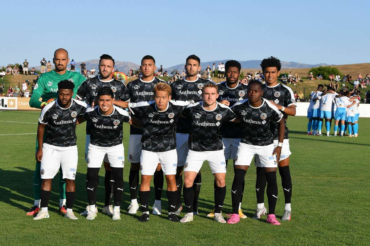 Oakland Roots SC starting XI before the game against Las Vegas Lights FC at Las Positas College Field in Livermore, CA on July 10, 2021. USL health and safety protocols forced the team to only have 13 players eligible for the game.