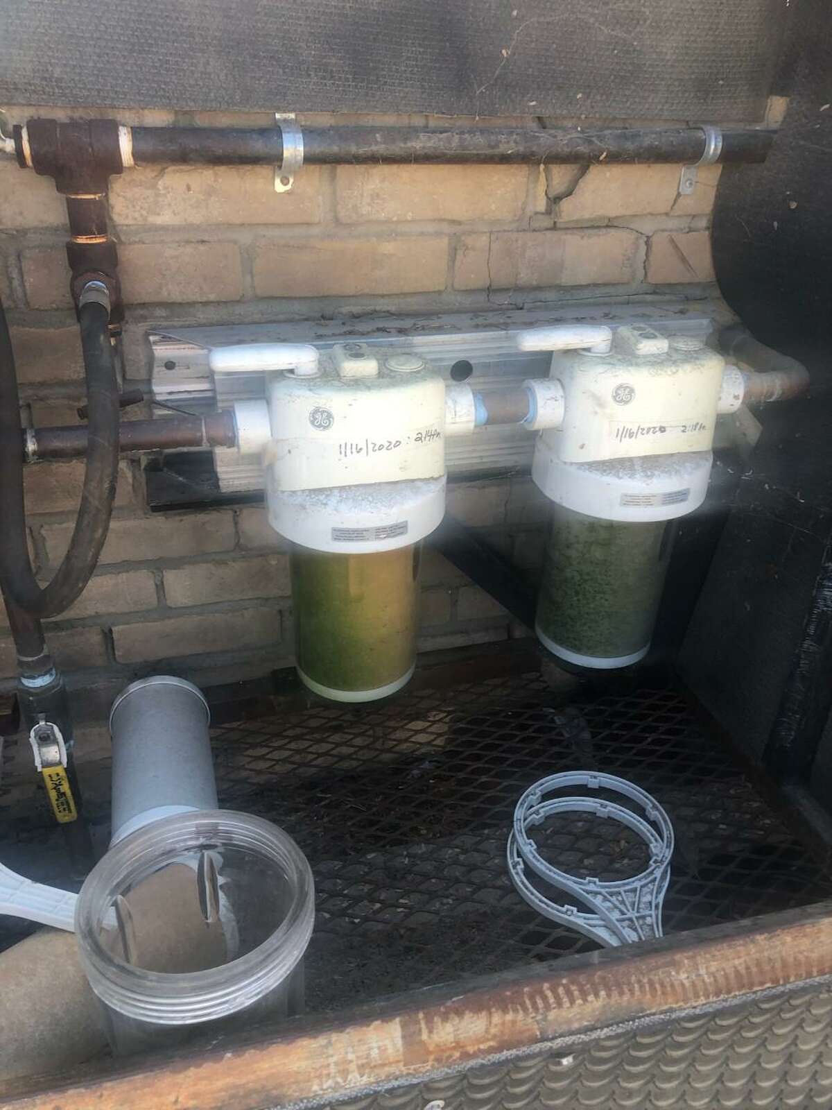 On the right is a new water filter, and on the left is how Federico Martin Reyes discovered the same filters just two weeks later before he alerted authorities.