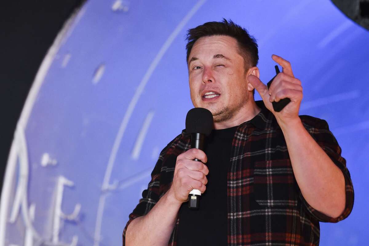 Elon Musk, co-founder and chief executive officer of Tesla Inc., speaks during an unveiling event for the Boring Company Hawthorne test tunnel in Hawthorne, south of Los Angeles, California on December 18, 2018. - Musk explained that the snail moves 14 times faster than a tunnel-digging machine. On Tuesday night December 18, 2018, Boring Co. officially opened the Hawthorne tunnel, a preview of Elon Musk's larger vision to ease L.A. traffic. (Photo by Robyn Beck / POOL / AFP) (Photo credit should read ROBYN BECK/AFP via Getty Images)