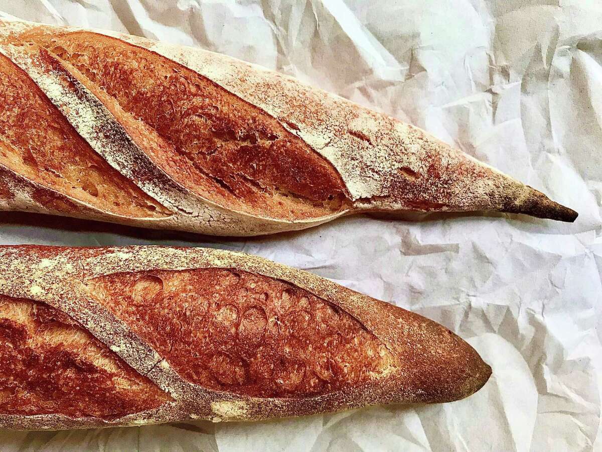 Organic sourdough baguettes from Artisana Bread are sold at the Urban Harvest Farmers Market.