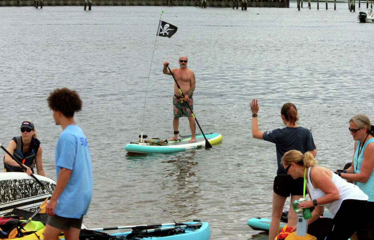 Above, Frank Fumega, of Stamford, paticipates in the 5th annual SoundWaters Flotilla at Boccuzzi Park in Stamford on Saturday. For most of the participants, it was a 4-mile journey on the water. The Flotilla is about paddlers coming together to protect the Sound and raise funds, according to organizers, and hundreds took part in the annual event. The event raises money to support SoundWaters research and education programs that protect the health of Long Island Sound. For more information about the nonprofit group, visit soundwaters.org.