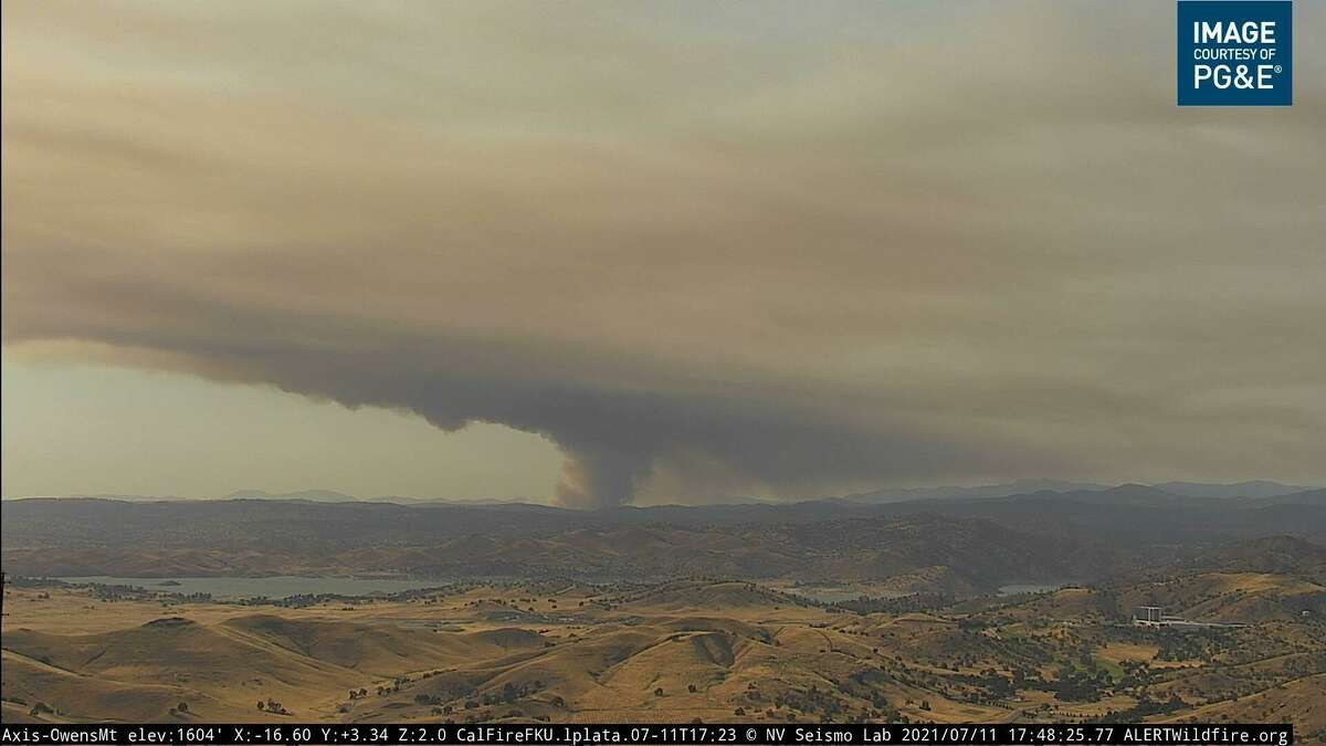 An image from a wildfire camera showing smoke billowing off of the River Fire burning across swaths of Mariposa and Madera counties.