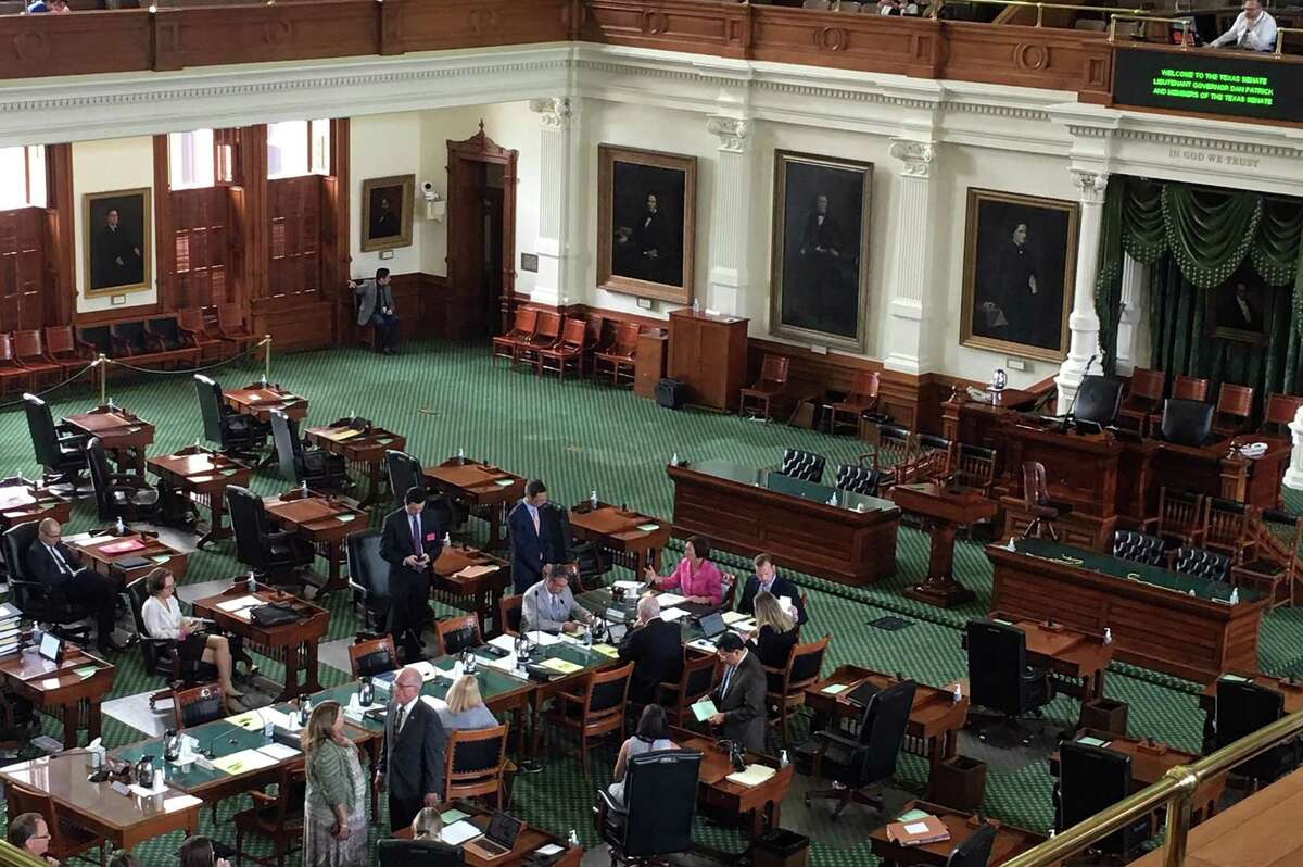 Republican state lawmakers gather in the Texas senate floor for roll calll prior to the hearing on SB 1 and SB 2 on Monday, July 12, 2021. House Demoicrats were preparing to fly to Washington D.C. to break ther quorum in an effort halt the Texas special session.