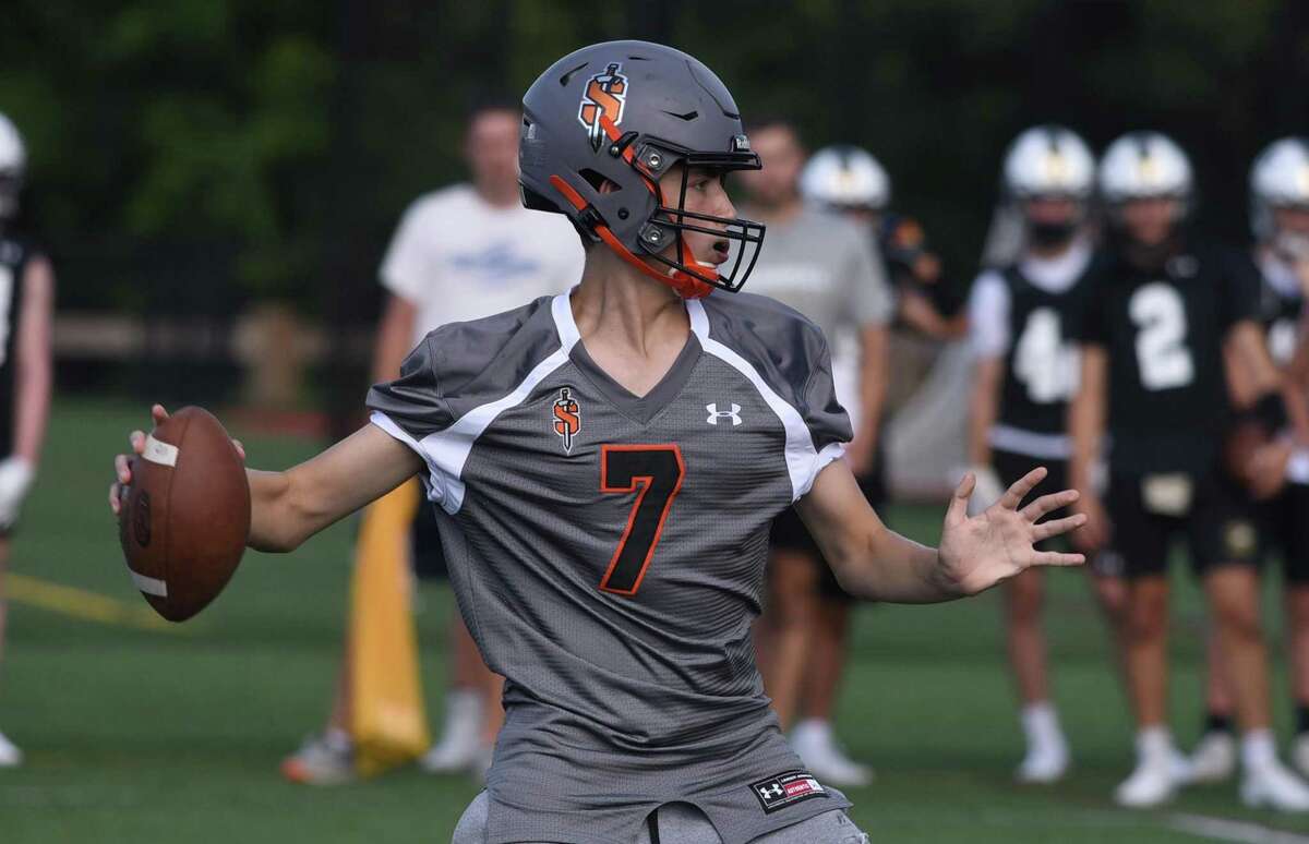 Stamford’s Jack Stokes throws a pass during the Grip It and Rip It football tournament on Friday in New Canaan.