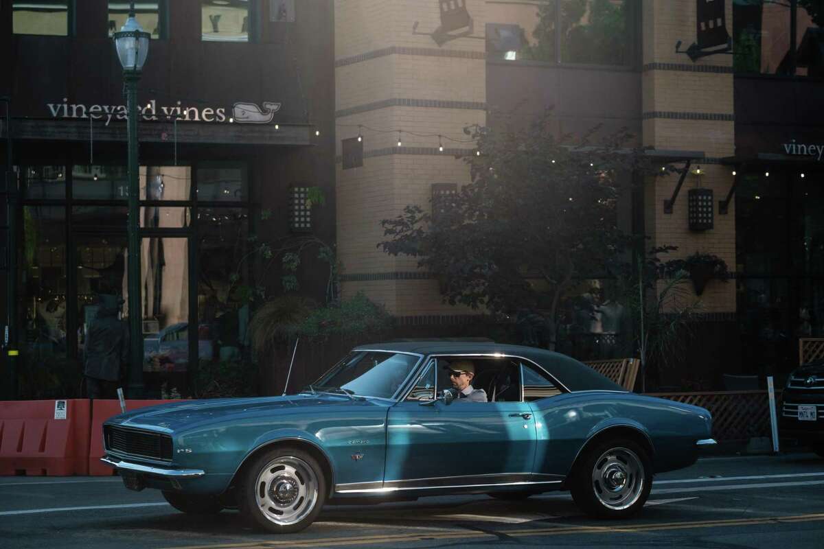 A drives a classic Camaro through downtown Walnut Creek.