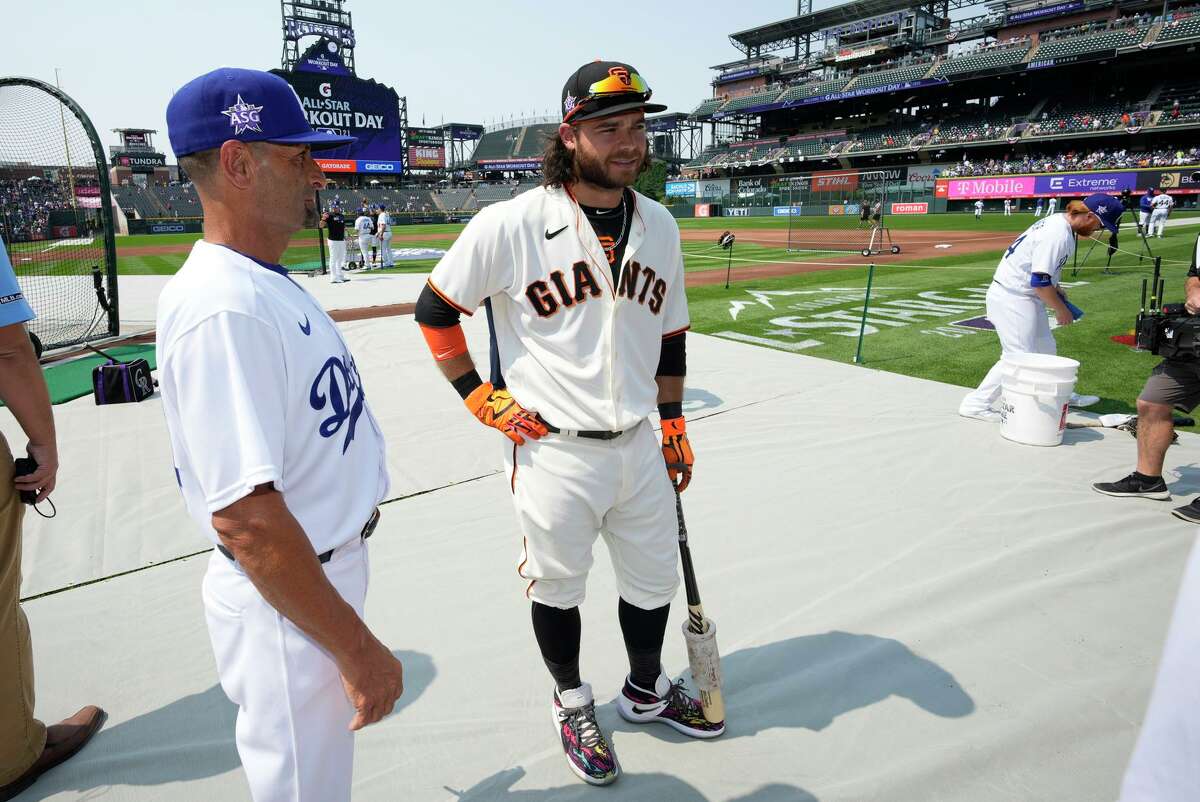 National League's Brandon Crawford, of the San Francisco Giants, waits to hit during batting practice for the MLB All-Star baseball game, Monday, July 12, 2021, in Denver. (AP Photo/David Zalubowski)