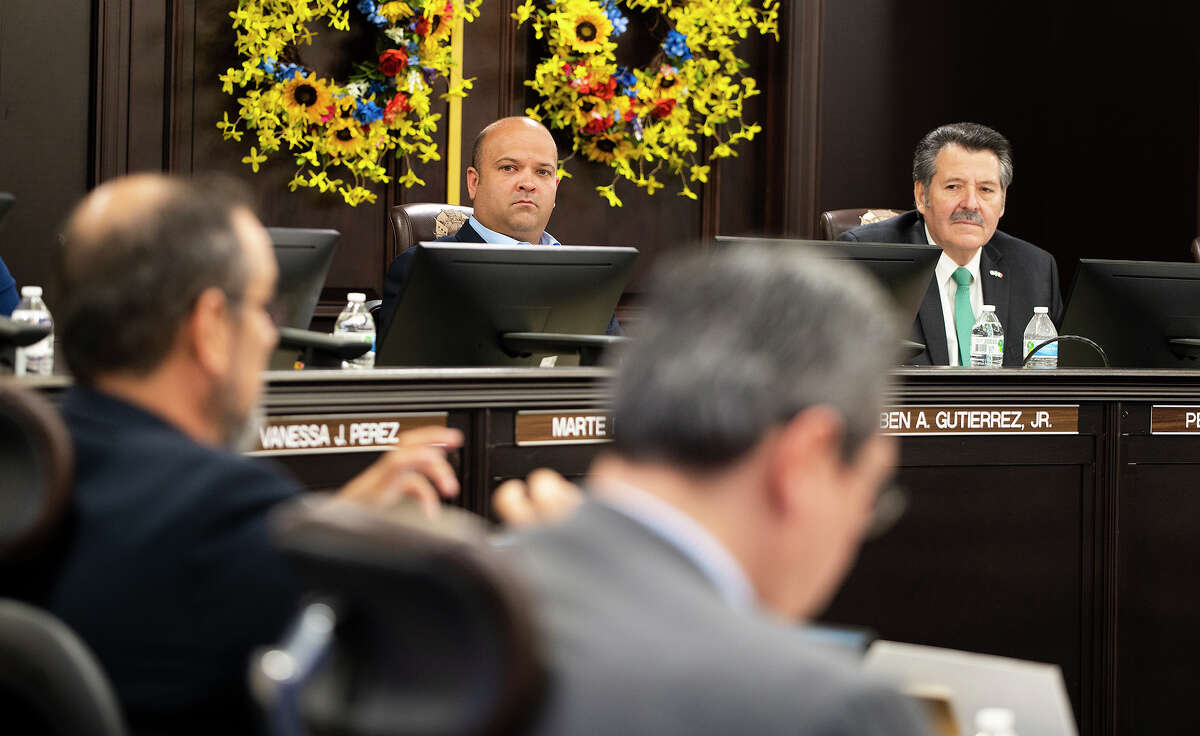 Laredo City Councilmember Ruben Gutierrez and Mayor Pete Saenza lisent as City Manager Robert Eads details the actions he has taken since the boil water notice took place, Monday, July 12, 2021, during a special city council meeting at City Hall.