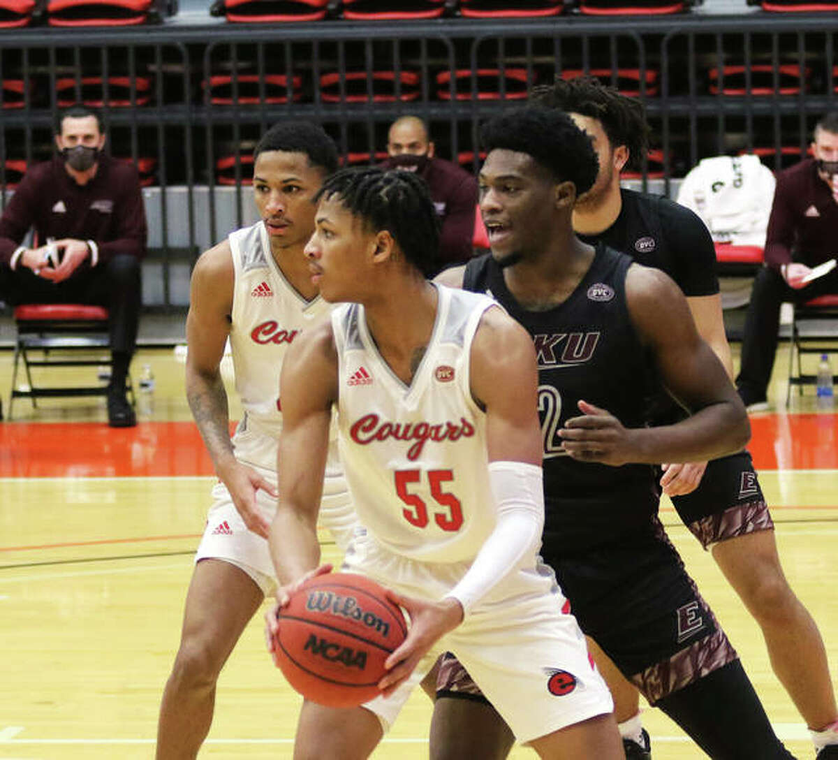 SIUE’s Lamar Wright (55) looks for a teammate in front of his twin Shamar Wright (left) during a OVC men’s basketball game against Eastern Kentucky last season at First Community Arena in Edwardsville.