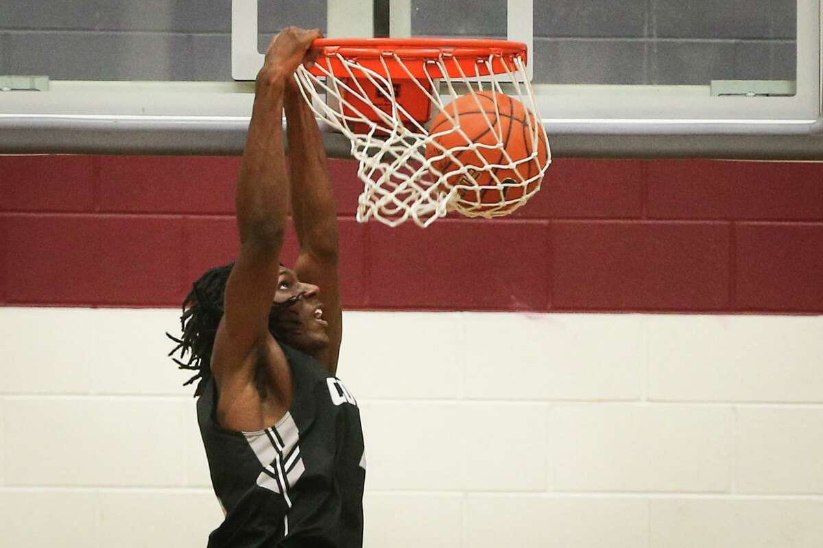 BASKETBALL Conroe grad Moore caps first professional season