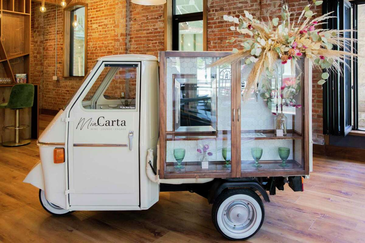 Mia Carta's vintage Piaggio "Ape" food cart, which is stationed in the parking lot and occasionally goes on the road.