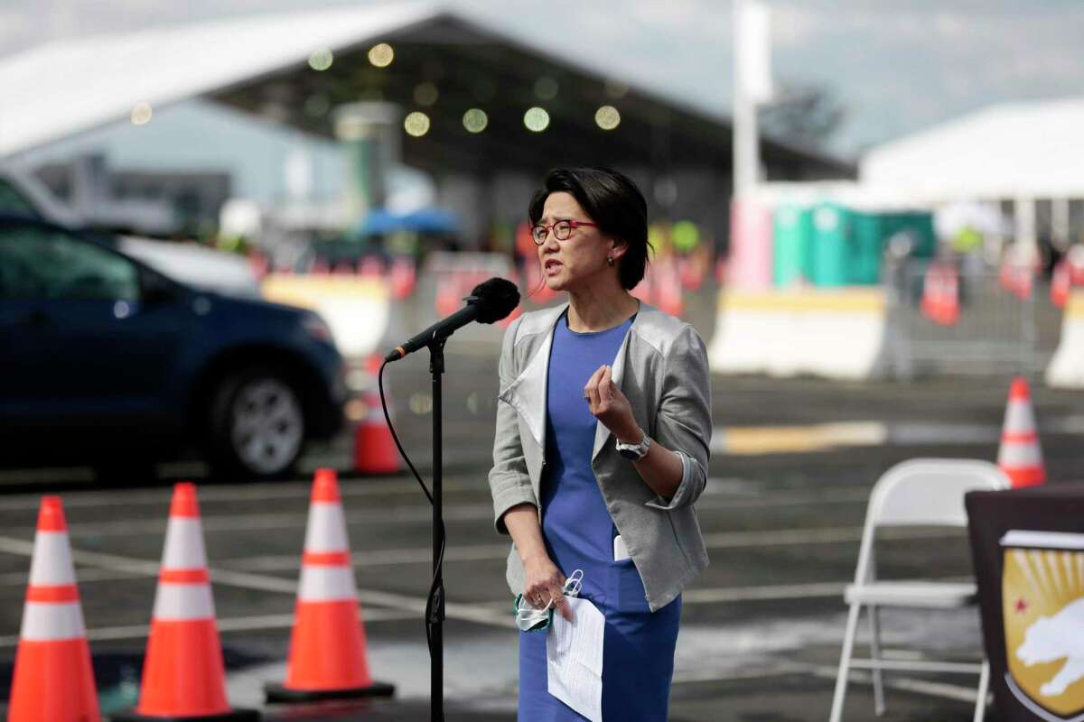 State epidemiologist Dr. Erica Pan, shown here during a 2021 news conference at the Oakland Coliseum, says the Bay Area is seeing the strongest increases in California among a statewide surge in COVID cases.