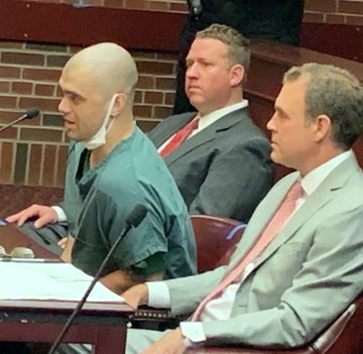 Jimmy Duffy, center, speaks in a Saratoga County court room Wednesday as Judge James A. Murphy III sentenced him to 18 years to life in prison Wednesday for his role in the savage 2019 bludgeoning of 22-year-old Allyzibeth Lamont in a Johnstown deli.
