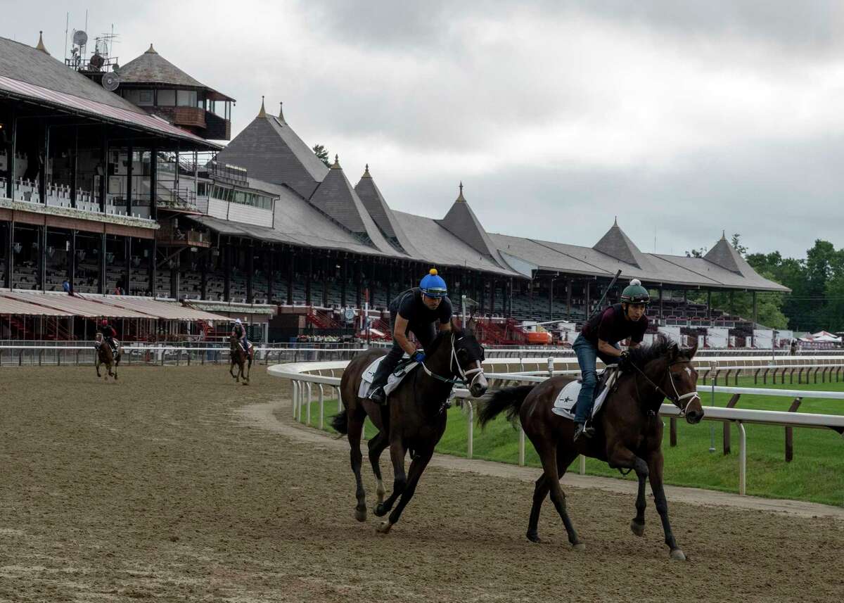 The number of horses is increasing as horses train on the main track at Saratoga Race Course on Wednesday July 14, 2021, the day before the 153rd opening day in Saratoga Springs.
