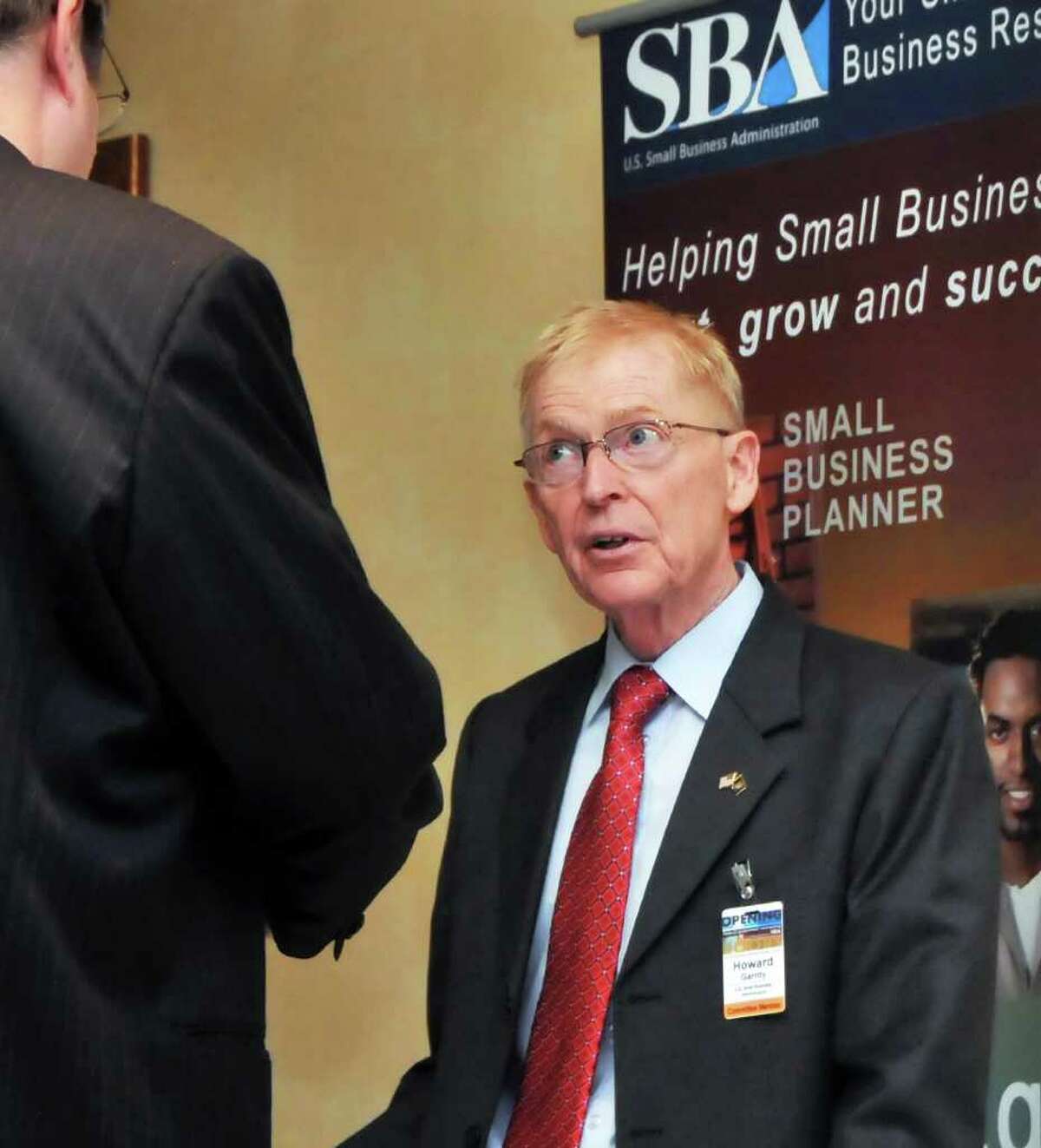 U.S. SBA's Howard Garrity of Syracuse answers questions during a small business networking conference at Albany Marriott in Colonie Tuesday morning September 14, 2010. (John Carl D'Annibale / Times Union)