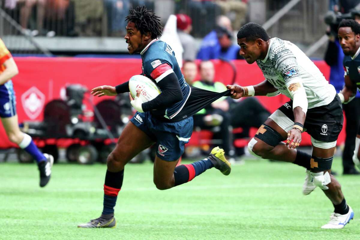 RUGBY: MAR 08 Canada SevensVANCOUVER, BC - MARCH 08: Apenisa Cakaubalavu (5) of Fiji holds onto the jersey of Kevon Williams (6) of the USA as he tries to run by him during their placing match at the finals of the Canada Rugby Sevens competition at BC Place Stadium on March 8, 2020 in Vancouver, British Columbia, Canada. (Photo by Devin Manky/Icon Sportswire via Getty Images)