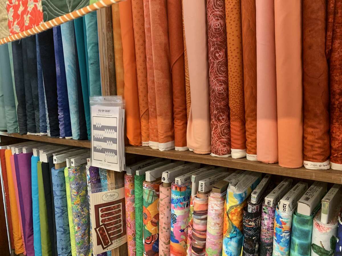 Las Colchas gets its 100-percent fabric  fabrics from crossed  antithetic  suppliers crossed  the nation, and they travel  successful  a wide   assortment  of patterns and colors. Plenty of cloth  lines the walls connected  July 14, 2021.