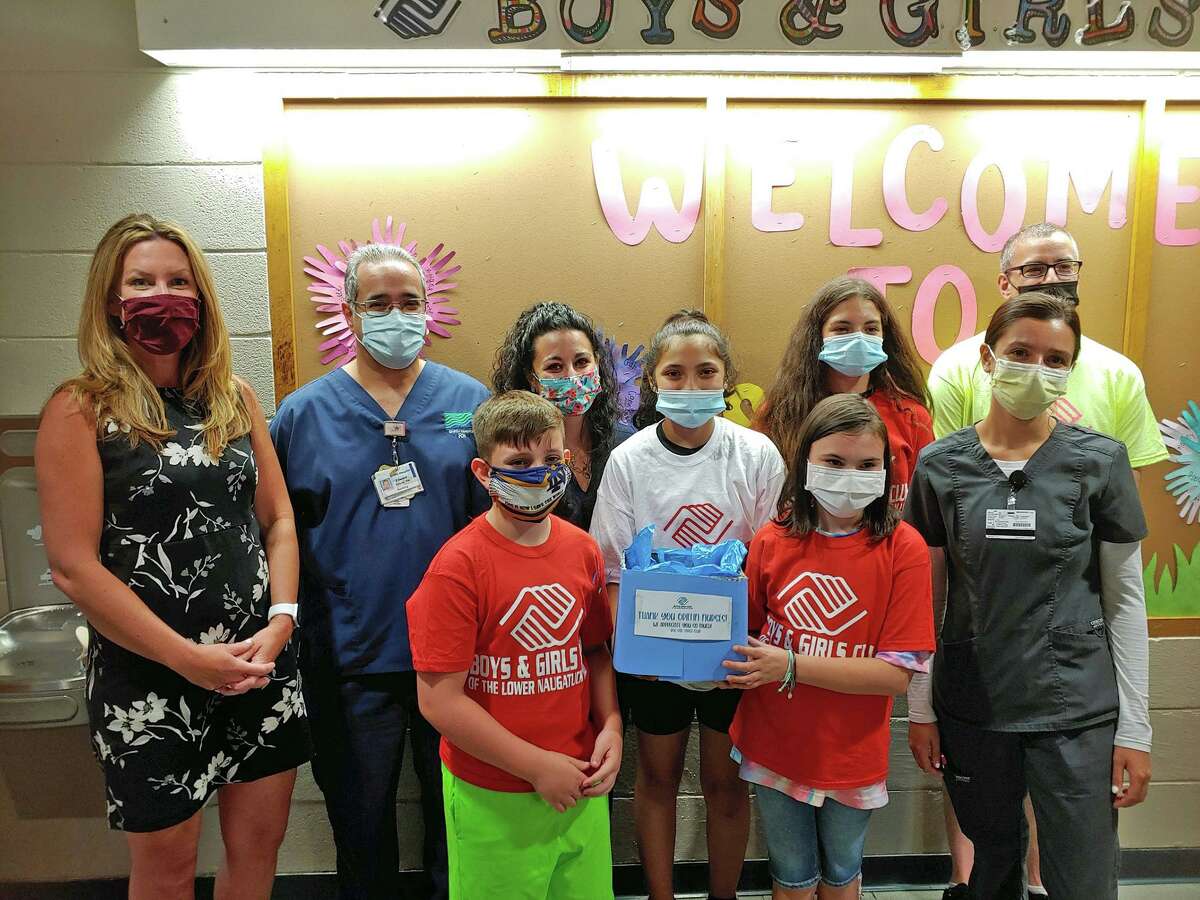 The Torch Club members of the Boys & Girls Club of the Lower Naugatuck Valley recently presented gift cards to Griffin Hospital nurses in appreciation for their dedicated service during the coronavirus pandemic. Pictured front row from left are: Torch Club Members Jonathan, Ashley and Melanie; and Jenna Papandrea, Griffin Hospital student nurse intern. Back row from left are: Shayne Roscoe, executive director of the Boys and Girls Club of the Lower Naugatuck Valley in Connecticut; Ed Valente, manager of Griffin Hospital ICU, Ashley D'Agostino, Griffin Clinical nurse educator, Torch Club Member Erin; and Mike Cannici, Torch Club program director.