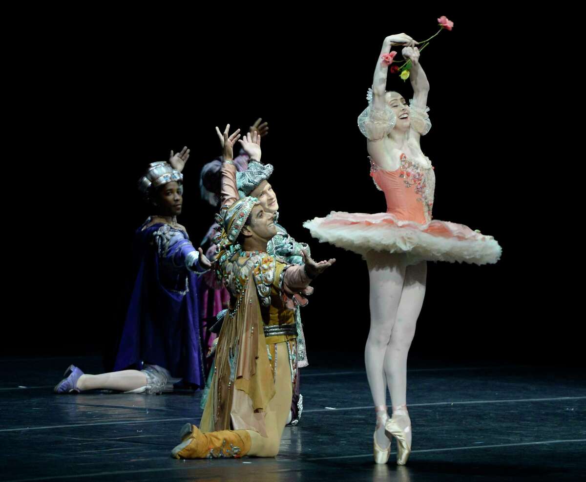 New York City Ballet dancers Meaghan Dutton-O'Hara with her band of "suitors" perform Rose Adagio from The Sleeping Beauty at Saratoga Performing Arts Center on Wednesday, Jul. 14, 2021 in Saratoga Springs, N.Y. (Jenn March, Special to the Times Union)