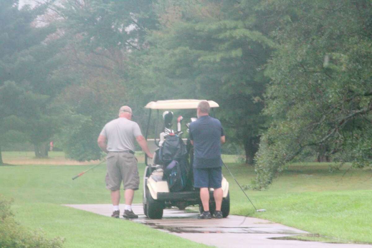 Marquette Trails golfers survived wet conditions on Tuesday. (Star photo/John Raffel)