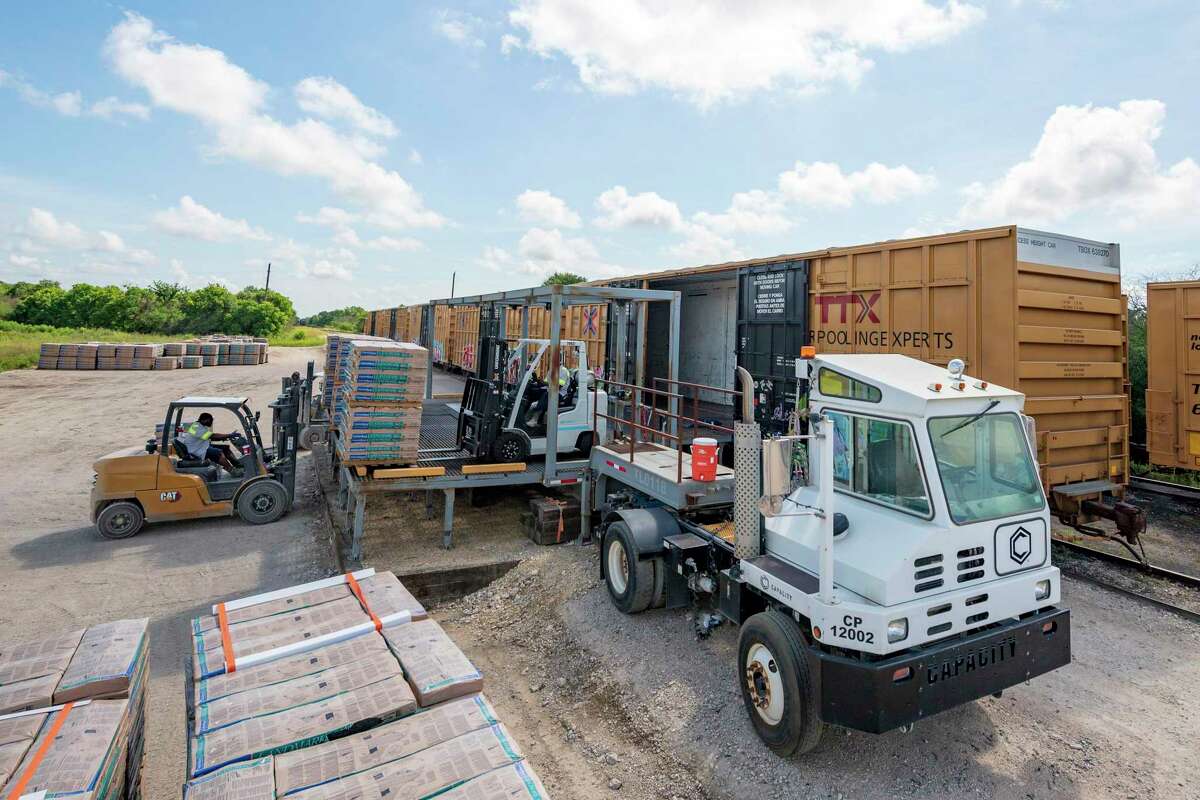 During operations at TLD Ramp Inc. which developed a patented mobile platform which can be pulled up to any train at any railroad spur for unloading any palletized cargo. Friday, July 2, 2021, in Sealy