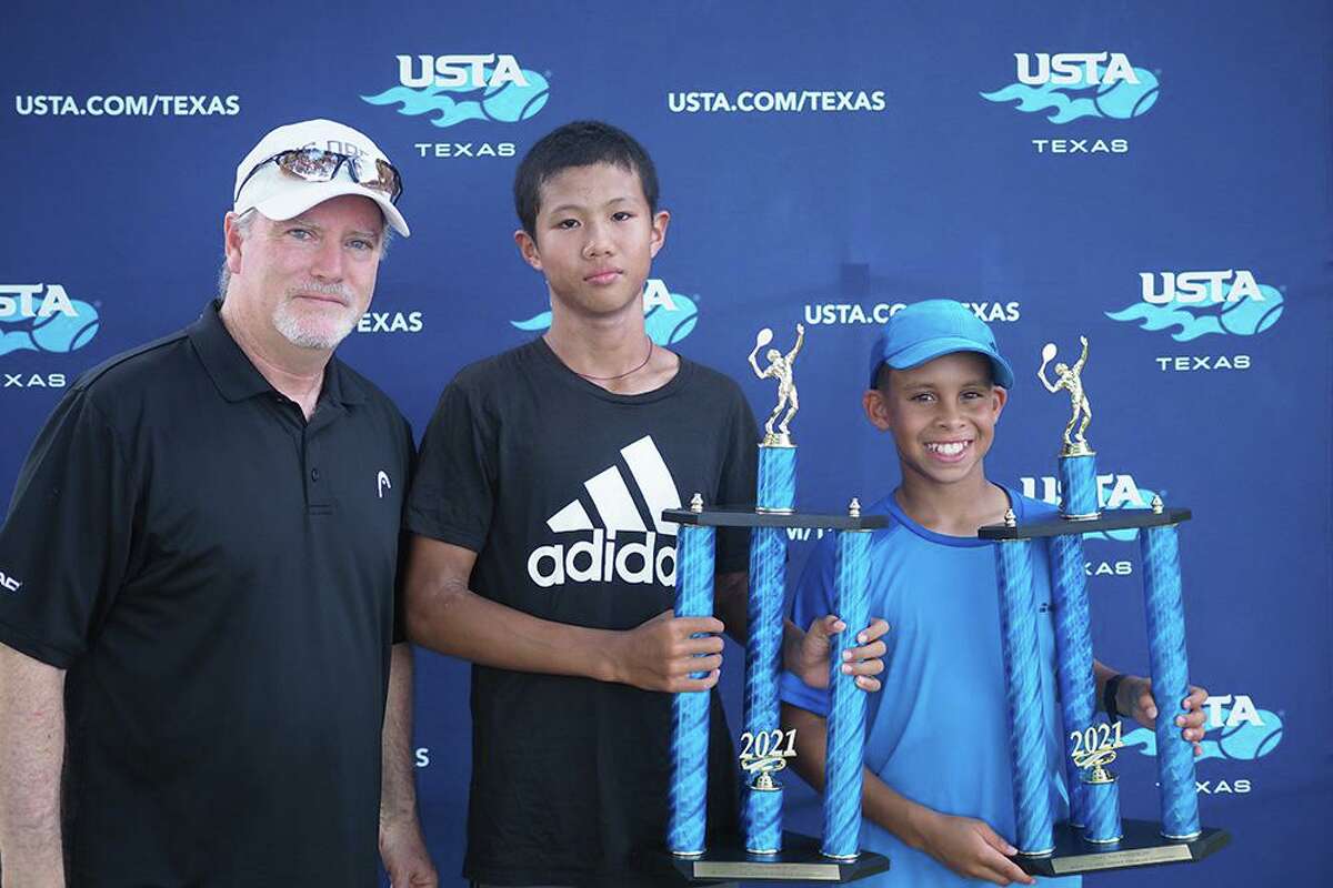 Elliott Awomoyi of Cypress and Aidan Xu of Katy won 12-and-under boys doubles championship at the 2021 USTA Texas Slam in Georgetown.