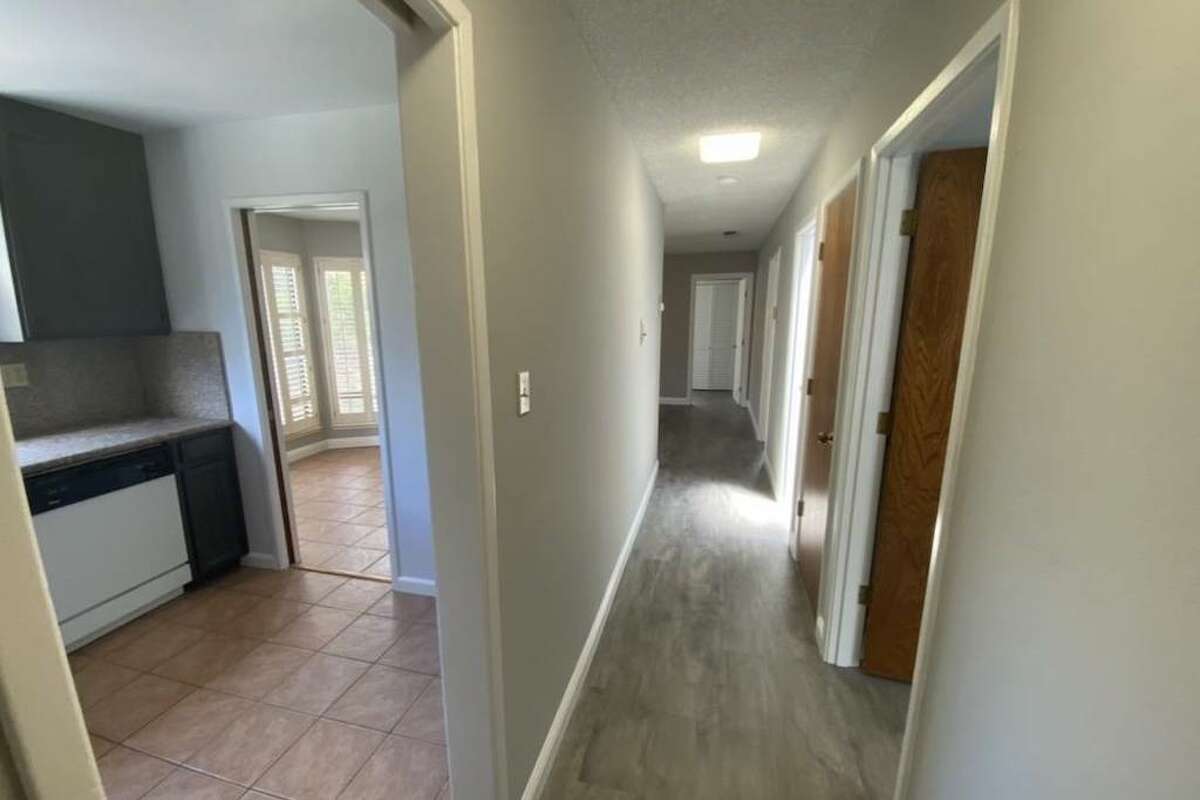 The unit is on the third floor and features hardwood floors and lots of natural lights, including skylights. 